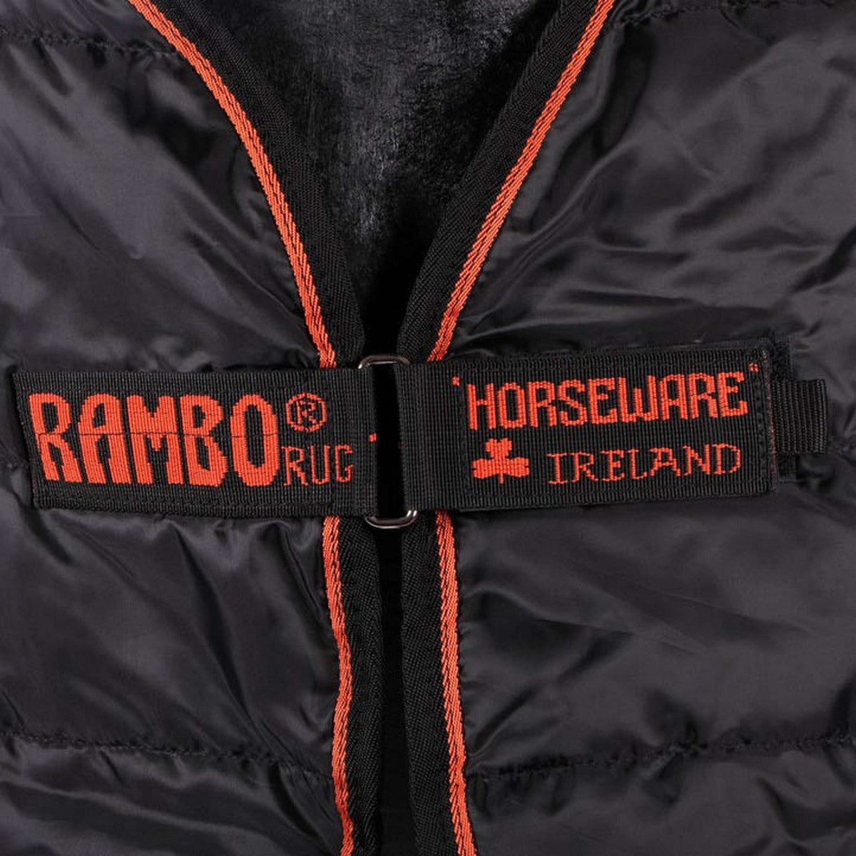 Rambo Couverture d'écurie Liner Ionic 100g Black/Black & Orange Stripe